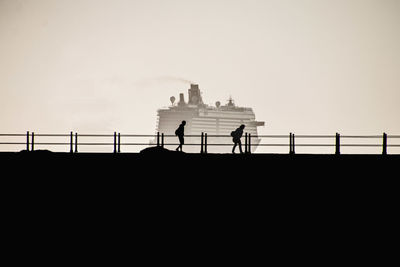 Silhouette of building against clear sky