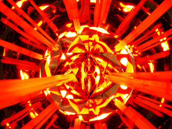 Low angle view of illuminated lights at night