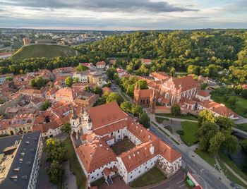 Vilnius old town with st. anne's church and gediminas castle in background. church heritage museum 