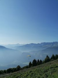 Scenic view of landscape and mountains against sky