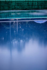 Reflection of clouds in swimming pool