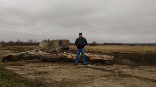 Full length of man standing on ground