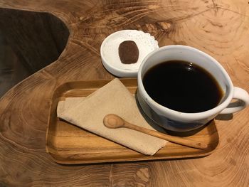 High angle view of coffee cup on table