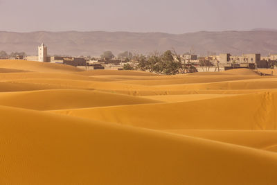 Scenic view of desert against sky