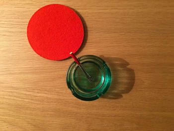 High angle view of heart shape on glass table