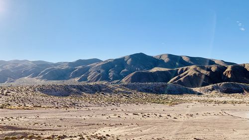 Scenic view of mountains against clear sky