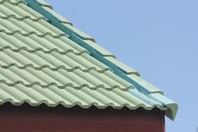 Low angle view of building against blue sky