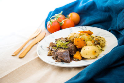 Close-up of food in plate on table