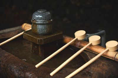 High angle view of burning candles on table