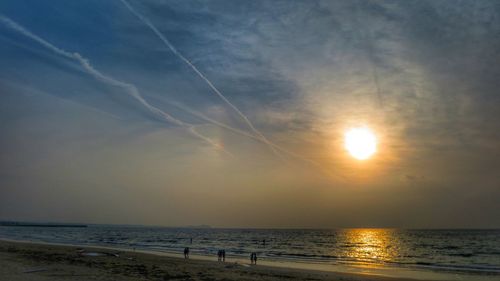 Scenic view of sea at sunset