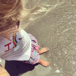 Low section of girl on beach