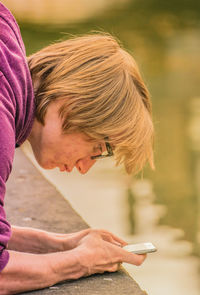 Close-up of woman using mobile phone