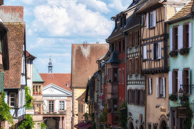 Riquewihr historical town timbered houses along the narrow cobble stoned street. taken in riquewihr.