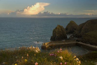 Scenic view of sea against sky during sunset