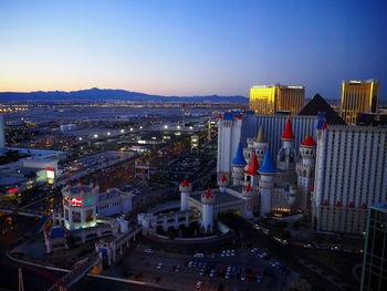 Illuminated cityscape at night