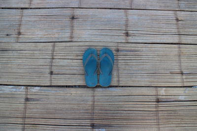 High angle view of shoes on wood