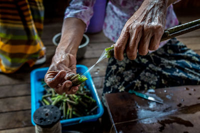 Close-up of woman in myanmar food market