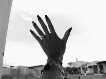 Low angle view of woman against sky