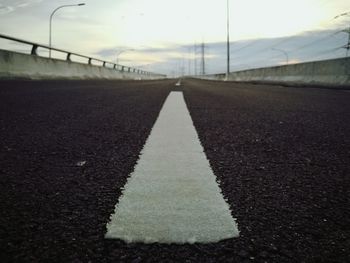 Close-up of road against sky