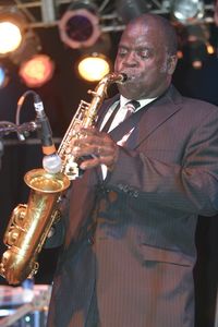 Midsection of man playing at music concert