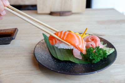 Close-up of sushi served on table