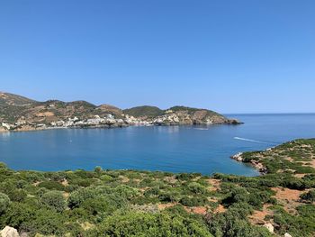 Scenic view of sea against clear blue sky