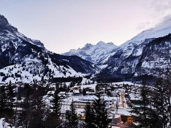 Scenic view of snowcapped mountains against sky during winter