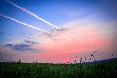 Scenic view of landscape against sky during sunset