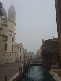 View of river with buildings in background