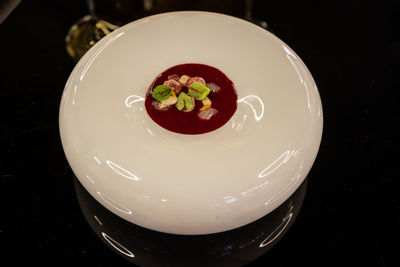 High angle view of fruits in plate on table