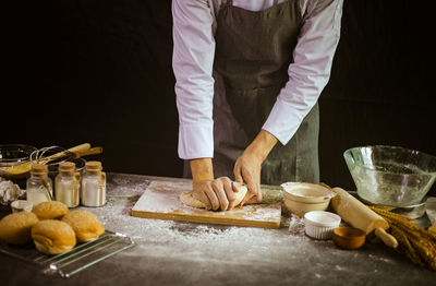 Man preparing food on table