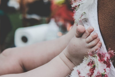 Low section of child on fabric