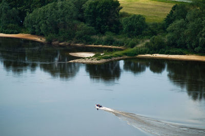 High angle view of man swimming in lake