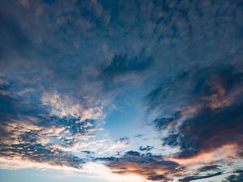 Low angle view of dramatic sky during sunset