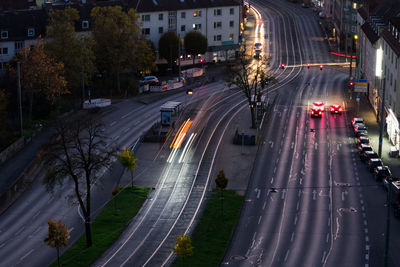 High angle view of light trails on city street