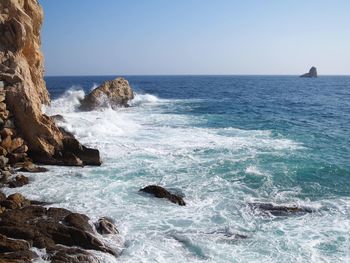 Scenic view of sea against clear sky