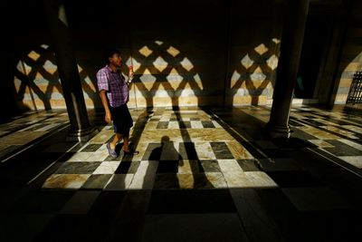 Man walking in corridor