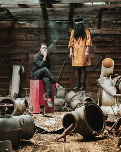 People sitting on old wood