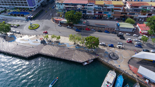 High angle view of vehicles on road in city