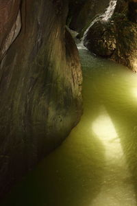 High angle view of rocks by river