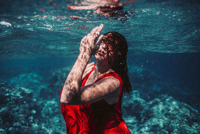 Man swimming in sea