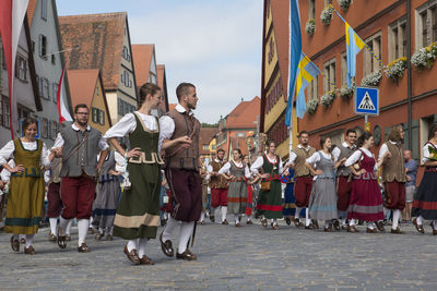 People on street in city