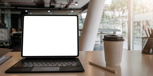 Coffee cup on table