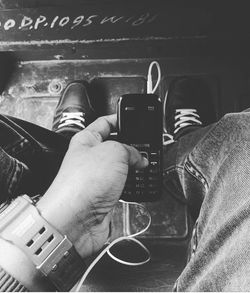 Midsection of man photographing
