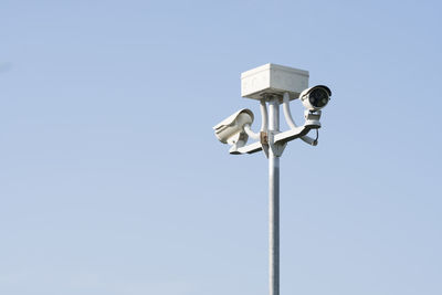 Low angle view of street light against clear sky