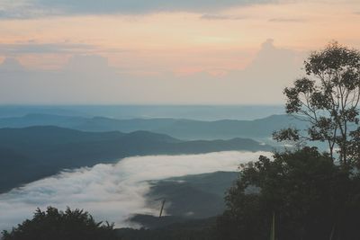 Scenic view of mountains against sky during sunset