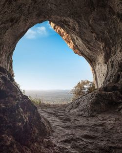 Scenic view of sea seen through tunnel