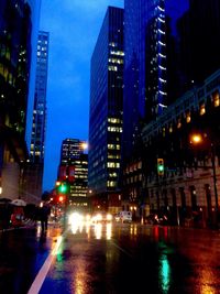 Modern buildings in city at night