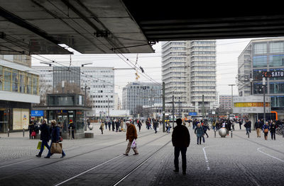 People walking on city street