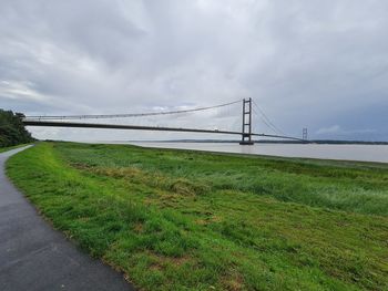 View of bridge over road against sky